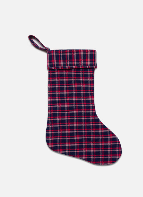 Plaid Christmas stocking on a white background