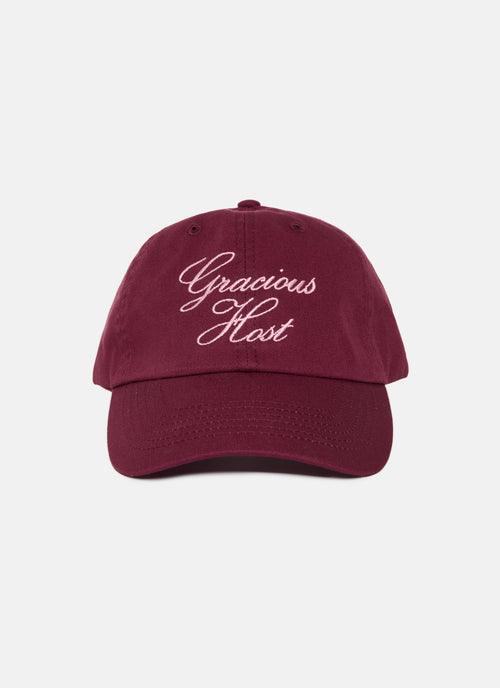 Maroon cap with 'Gracious Host' text on a light gray background