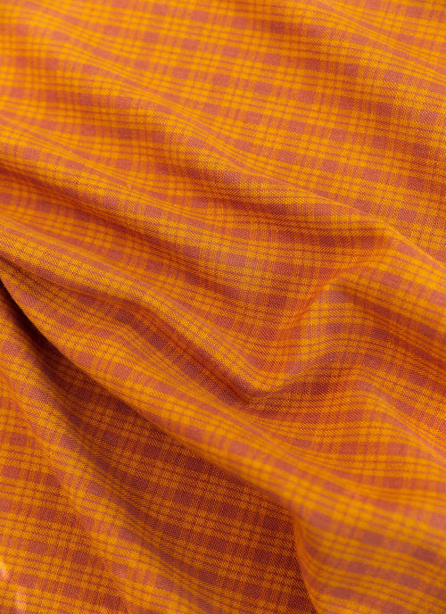 Close-up of orange and purple checkered fabric