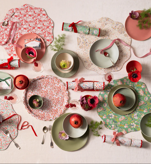 Winter table setting with placemats, place cards, and crackers 