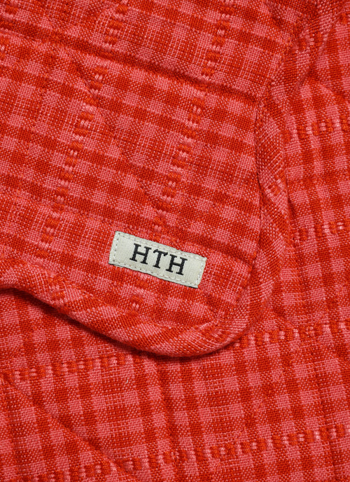 SOHO - Guava Scalloped Quilted Placemat