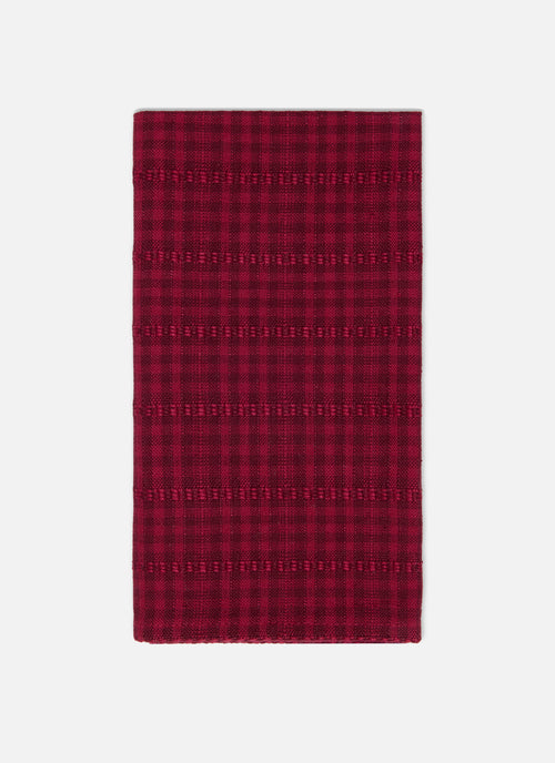 Red checkered towel on a white background