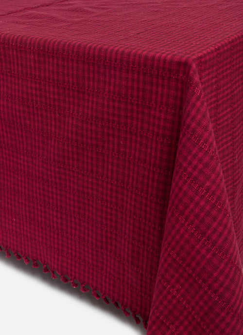 Red/Purple textured tablecloth on a white background